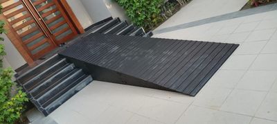 A durable accessibility ramp with a gentle incline and a smooth surface transition.