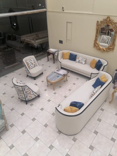 A premium living room sofa set featuring custom-built internal wooden framing and high-quality upholstery.